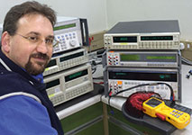 SAA technician Kobus Venter with the Fluke calibrators at the avionics laboratory.